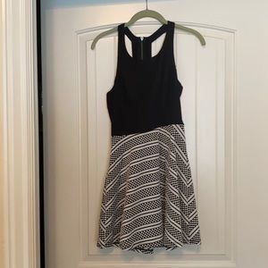 Material Girl Dress. Size S. Colors Black, White and Neon Orange.